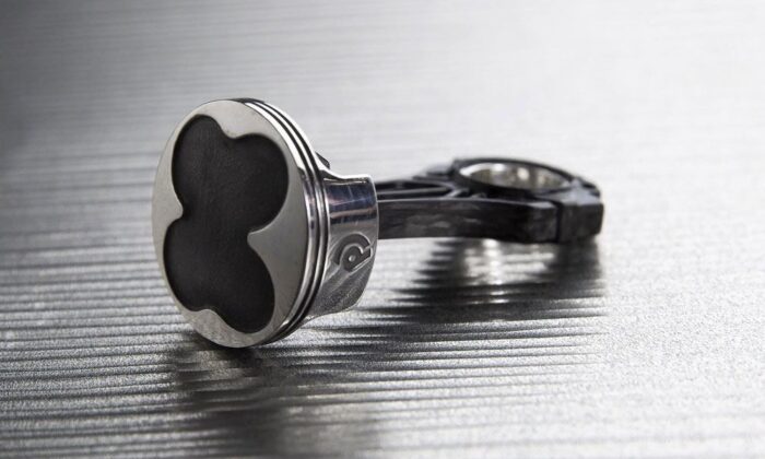 Discommon Goods Ferrari Piston Keychain