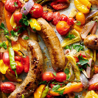 Sheet-Pan Sausage With Peppers and Tomatoes